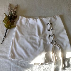 White skort with side lace up detail